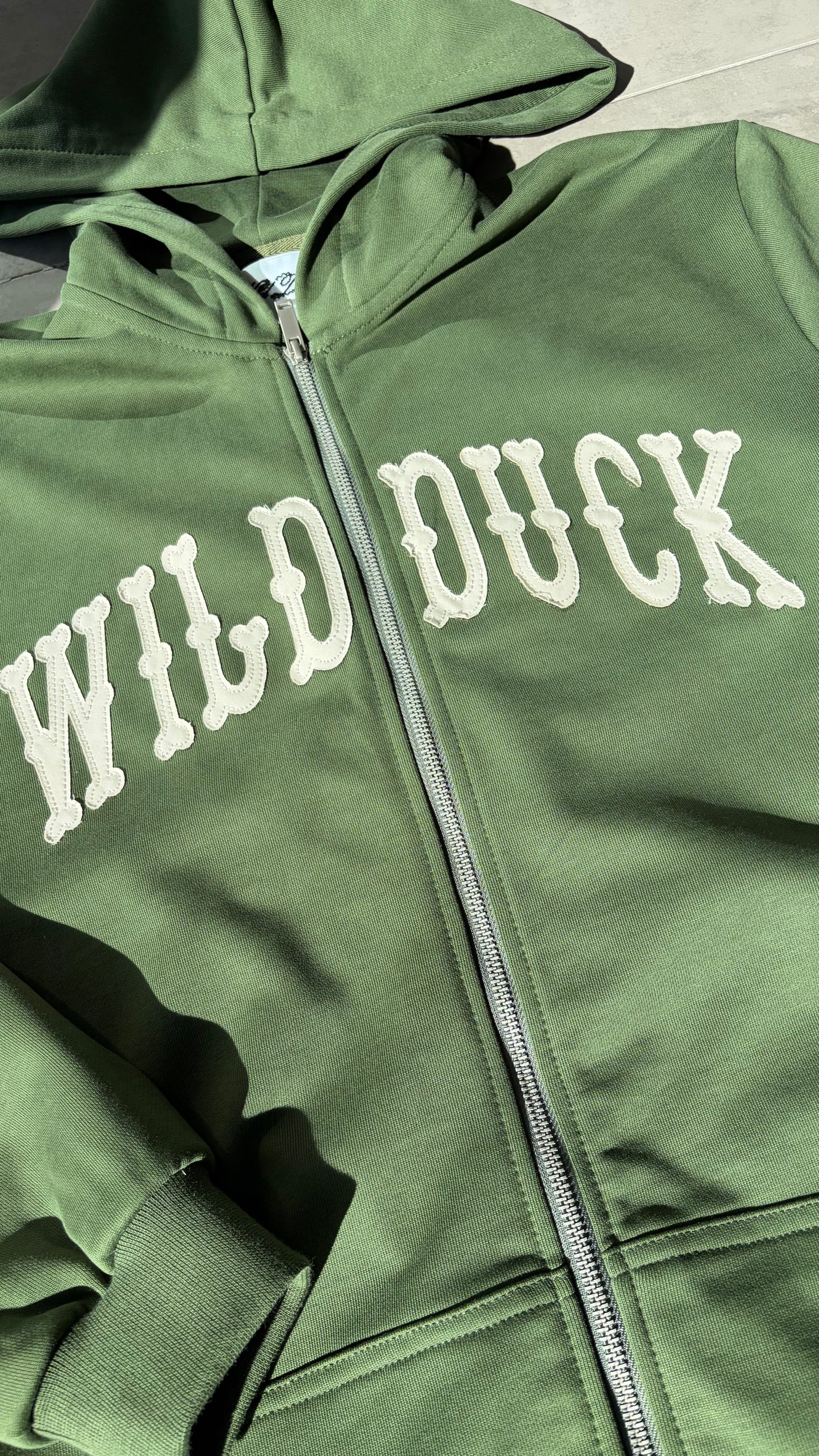 DISTRESSED ZIP UP HOODIE