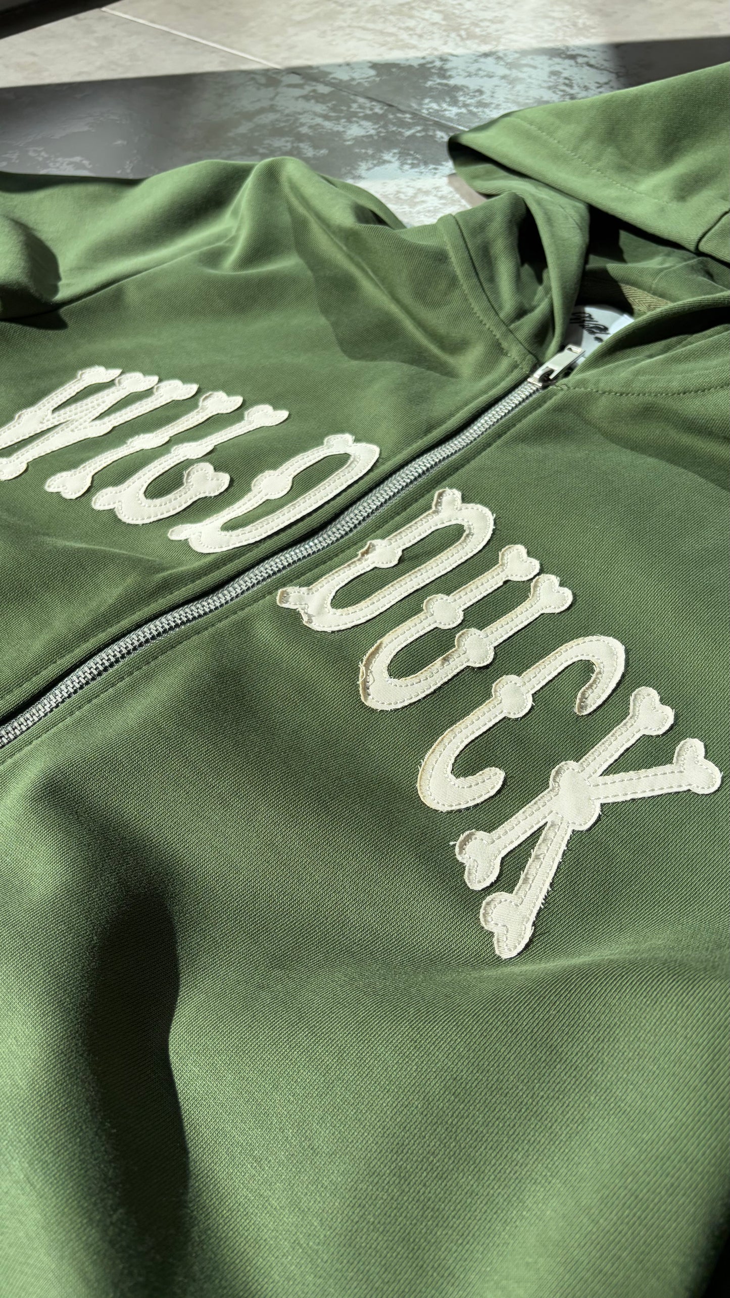 DISTRESSED ZIP UP HOODIE